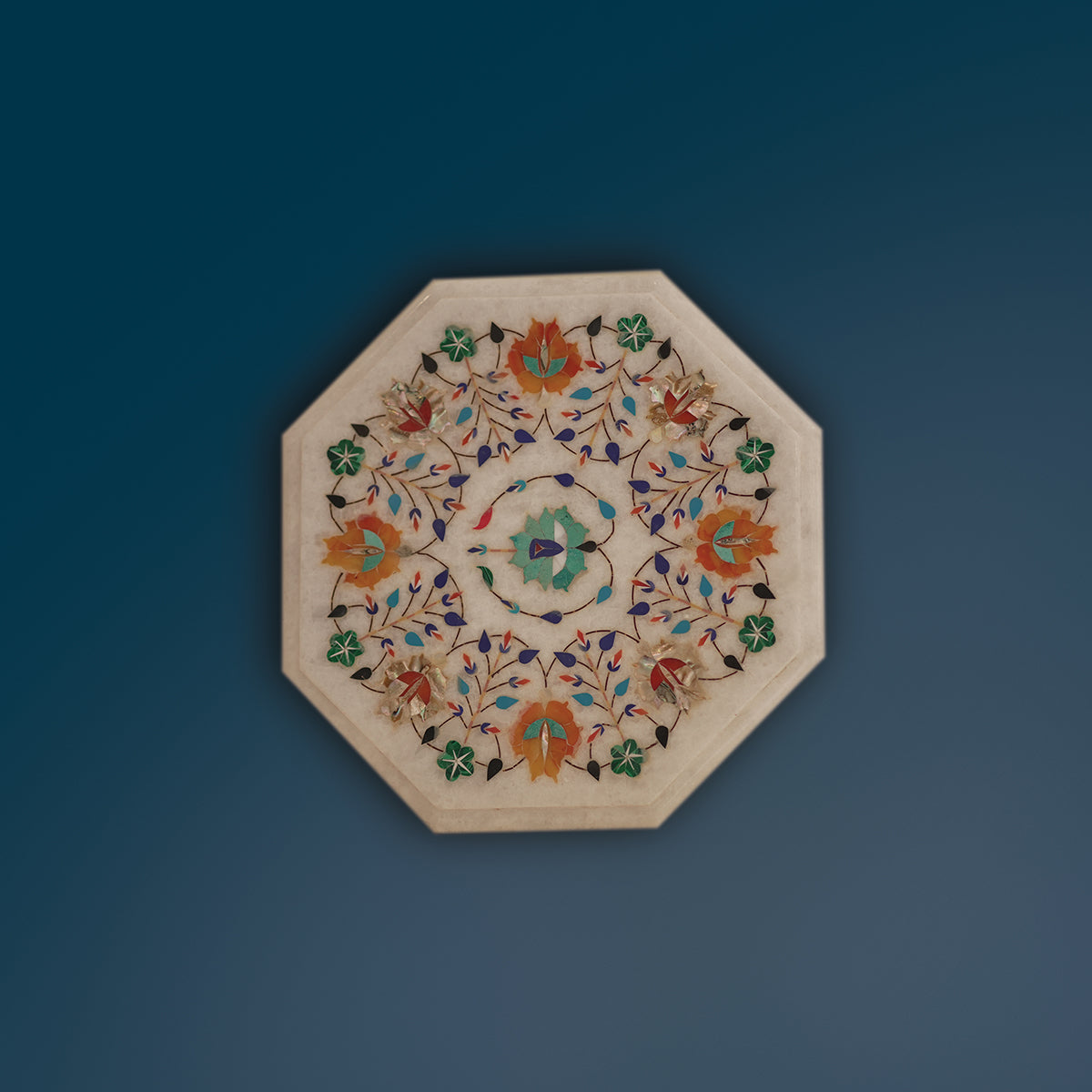 Elegant white marble tabletop featuring colourful inlay stones