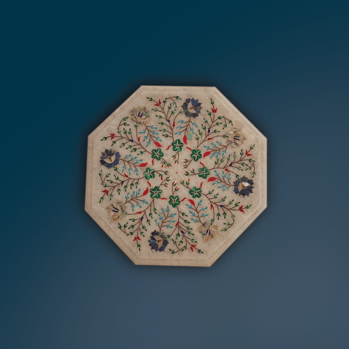 Premium white marble tabletop adorned with gemstone inlay