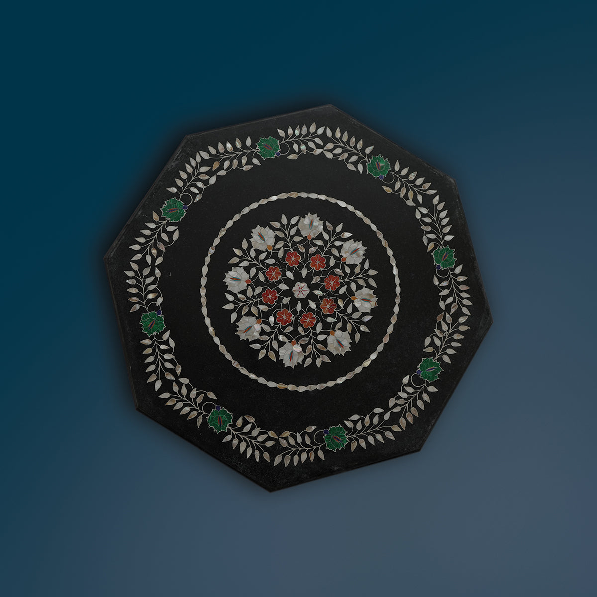 Classic white marble table top with floral inlay patterns