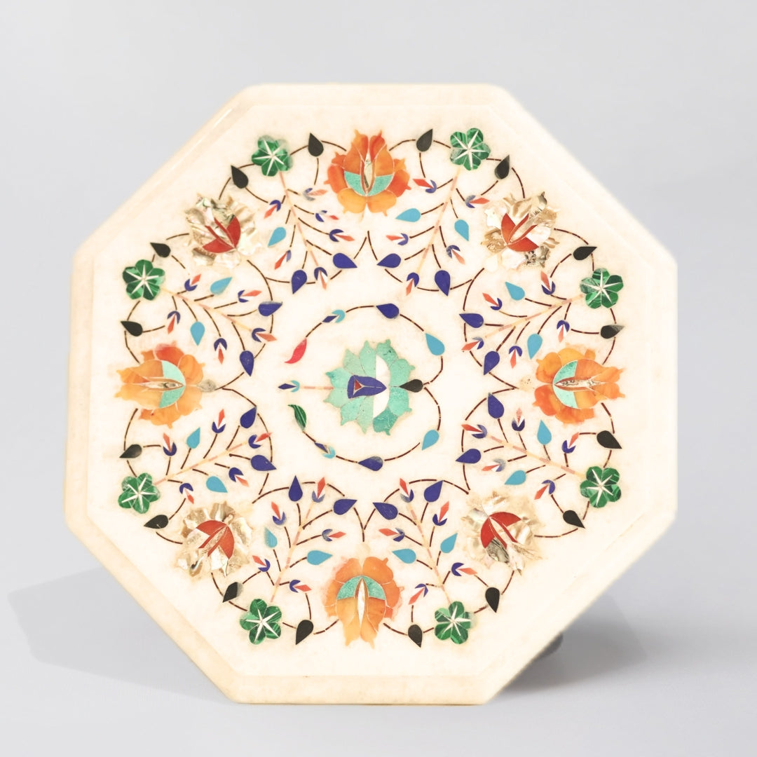 Elegant white marble tabletop featuring colourful inlay stones